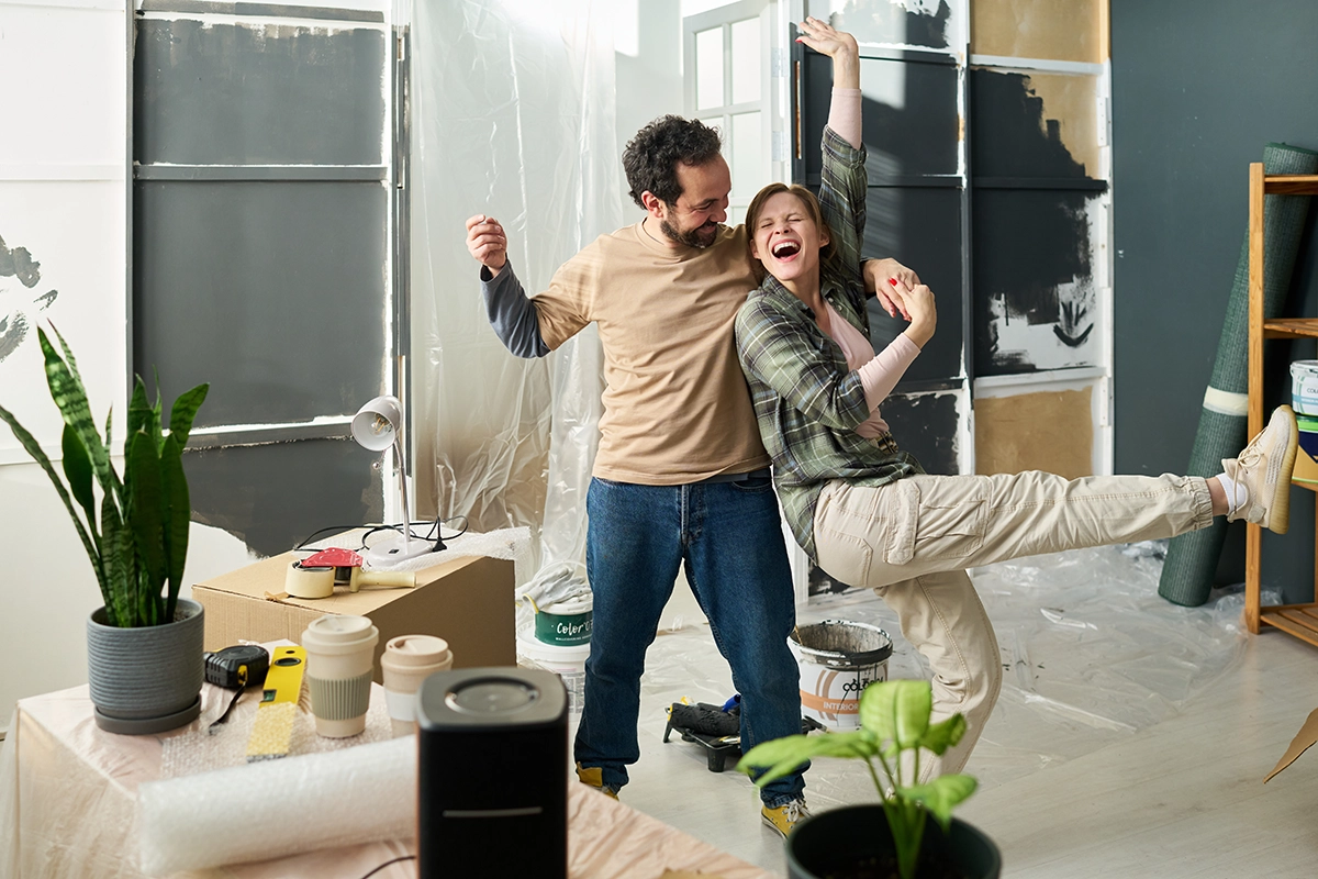 happy-couple-celebrating-home-improvement-success-2026-03-24-05-07-39-utc